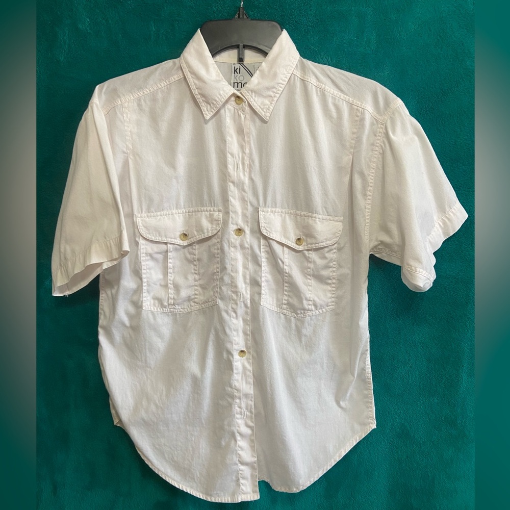 Ki Ko Mo woman’s short sleeve, off-white shirt, in a size small.